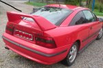 OPEL CALIBRA:Spojler na zadnú kapotu W-32